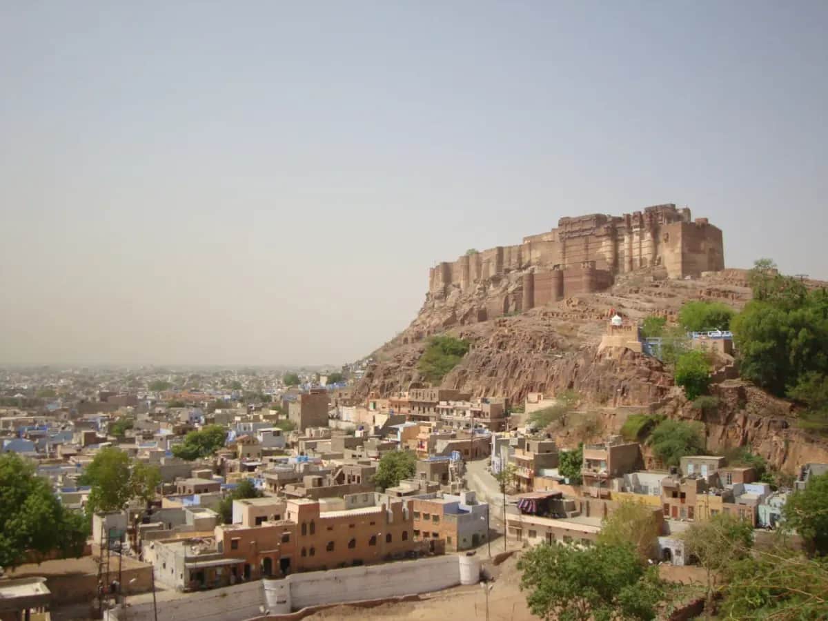 Mehrangarh Fort rising above Jodhpur’s blue houses